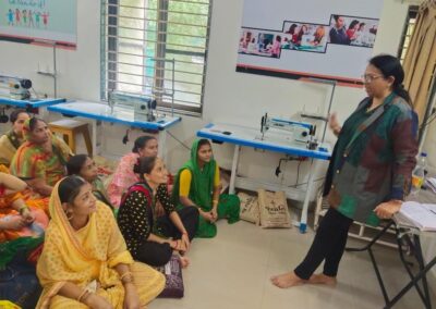 Bhavini Parikh training a group of smiling women at Bunko Junko