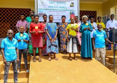 Health staff, expectant moms, and SHU team members in a group photo to commemorate the launch of SB+HH at the clinic